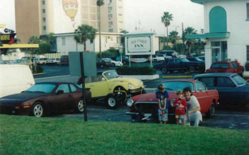 Again, before of the days of the internet, a dealer would have to buy cars in person at auctions. Sometimes this meant driving to Florida to buy cars! Depicted in front of the Volvo P1800 is: Jayme Parolin (long shorts), Jon Parolin (short shorts) and Terry’s long-time friend Ian Shago (mullet). This particular “Florida run” saw Terry at the wheel of a 1985 Porsche 944, Joanne 4-wheel towing a 1969 Volvo P1800 with a wood paneled Chevy caprice wagon. Ian handled the Volvo 240 towing the beetle cabriolet.