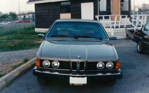 Hammond lot, late 80’s. Note the license plate frames on the 633i. We have always tried to remain very close in design to our original. Many people have commented over the years that our cars or so easily recognized by the black and gold licence plate frames. Also of note is the whiteboard on the wall beside the door of the sales office. This board providing potential clients all the info they needed for our current stock before the days of the website. Far too easily tampered with…