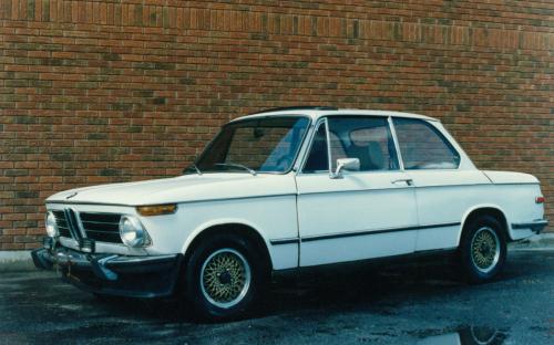 Very cool 1973 BMW 2002 Tii posing for its “album shot “against the brick wall of the Mandarin restaurant.