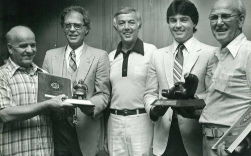 The late Earl Parolin (left) receiving a recognition award from General Motors Canada for 25 years of participation in one of their technical service programs. In 1985 at the age of 69, Earl decided to retire and help his son Terry in a new business venture. By retirement, Earl had over 40 years of experience as an automotive technician, nearly all as a General Motors master technician. He quickly acclimatized to working with European cars and never looked back.