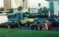 Again, before of the days of the internet, a dealer would have to buy cars in person at auctions. Sometimes this meant driving to Florida to buy cars! Depicted in front of the Volvo P1800 is: Jayme Parolin (long shorts), Jon Parolin (short shorts) and Terry’s long-time friend Ian Shago (mullet). This particular “Florida run” saw Terry at the wheel of a 1985 Porsche 944, Joanne 4-wheel towing a 1969 Volvo P1800 with a wood paneled Chevy caprice wagon. Ian handled the Volvo 240 towing the beetle cabriolet.